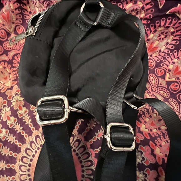 Dolls Kill • Logo Black Mini Backpack with silver exposed zipper, adjustable - Picture 2 of 4